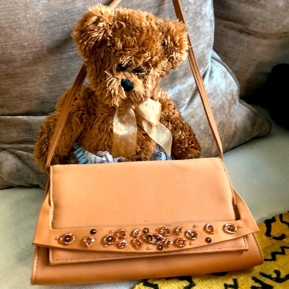 Claudina tan evening bag. Small purse with various beads adorning front flap